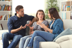 young adult planning with parents before she leaves for college